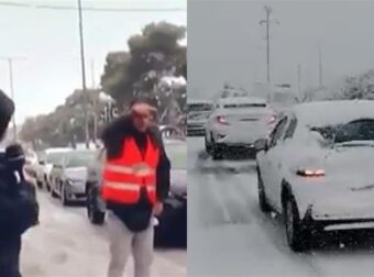 Απίστευτο βίντεο: Διανομέας σε χρέη τροχονόμου στη Λεωφόρο Μαραθώνιος